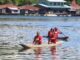 Polres Jayapura Gelar Lomba Dayung Tradisional Meriahkan HUT Bhayangkara ke-79