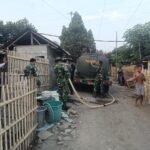 Peduli Kemarau Panjang Akibat El Nino, Kodim 1310/Bitung Gerakkan Bakti TNI, Salurkan Air Bersih "Door To Door" Bantu Warga Terdampak Kekeringan